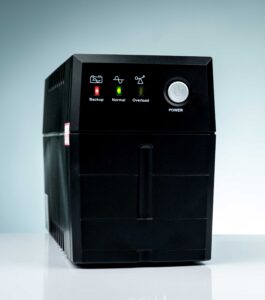 Uninterruptible power supply system using an internal rectifier to convert incoming AC power to stable DC battery power.